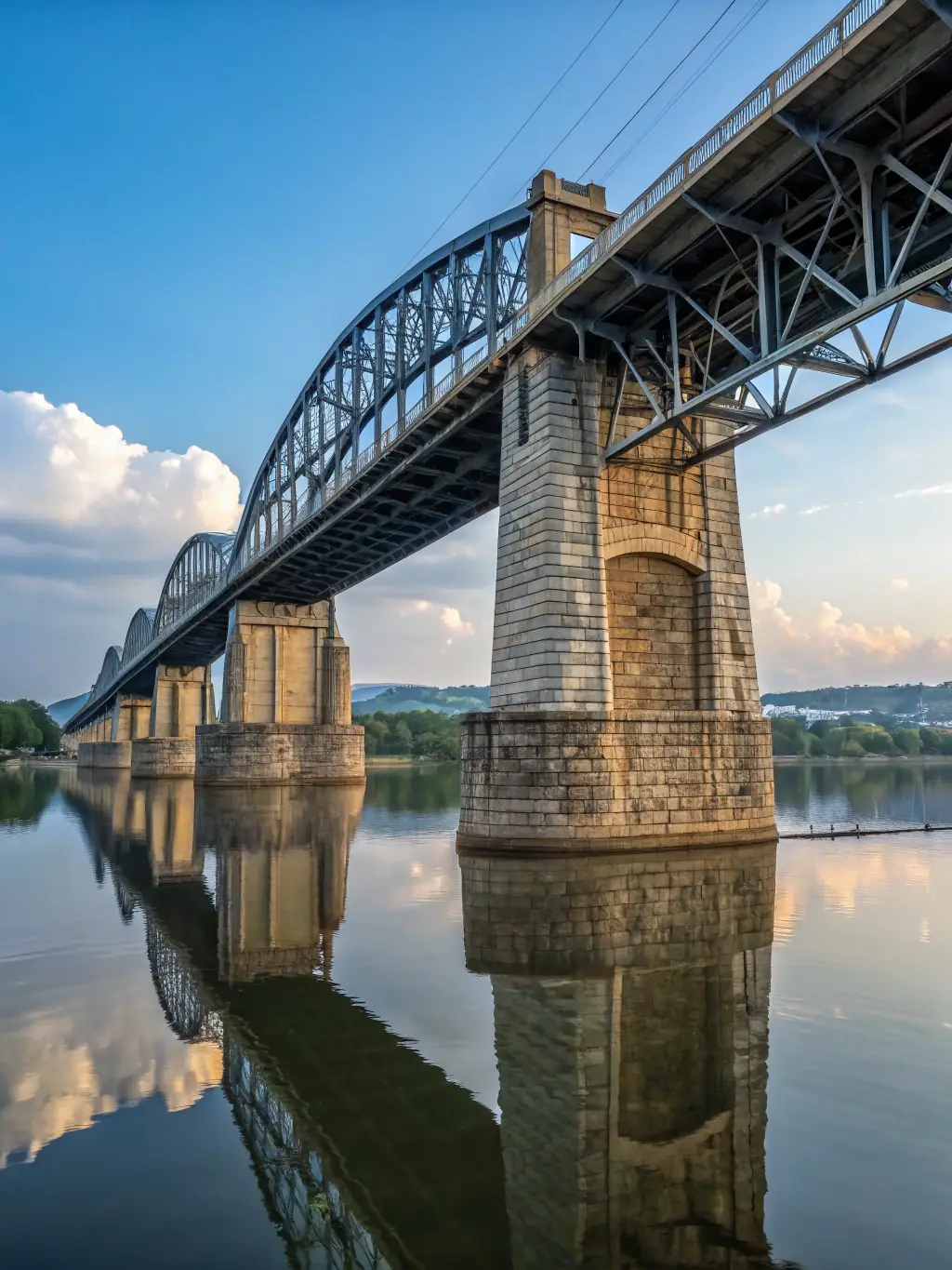 A picturesque image of a newly constructed wooden bridge on a walking trail, highlighting the organization's commitment to enhancing trail infrastructure.